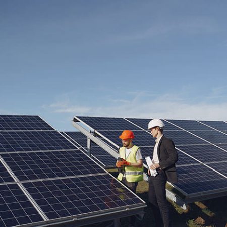 foreman-and-businessman-at-solar-energy-station